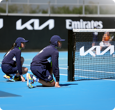 Ballkids ready at net